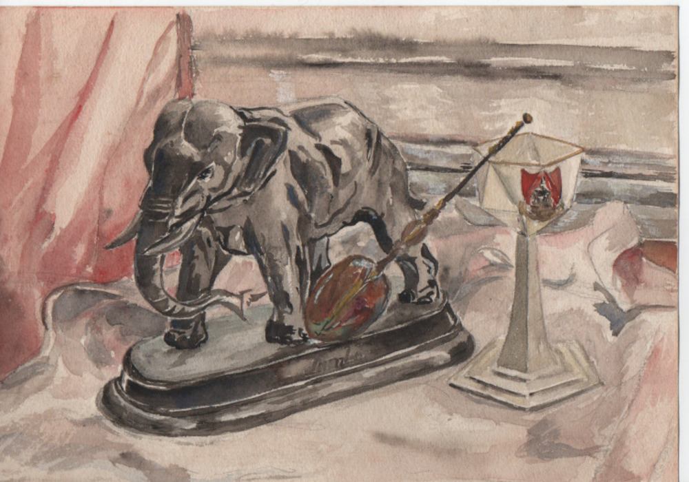 A metal elephant with the inscription 'Jumbo' - I stil have the elephant - a paperweight I think.