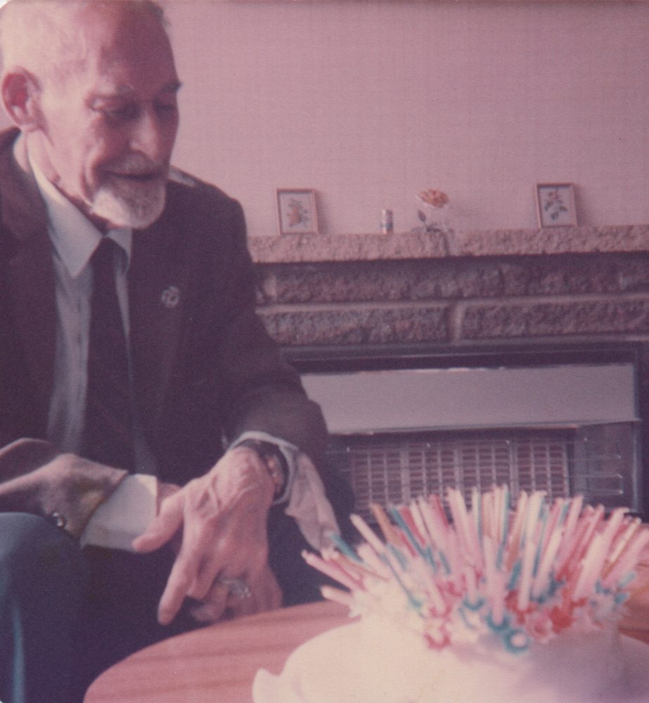 George with birthday cake - possibly 80th?