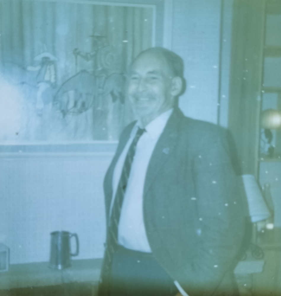 George with his favourite painting by Paynton - I still have the painting.